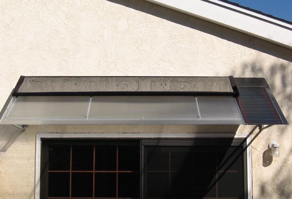 Awning mount 8' Building Integrated Solar Forced Air Heating panel with fan PV on right
