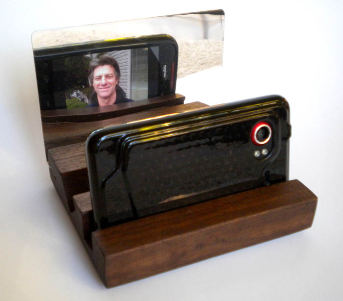 Incredible Droid smartphone sitting in the new SmartPhone Mirror Stand, with the mirror on the left